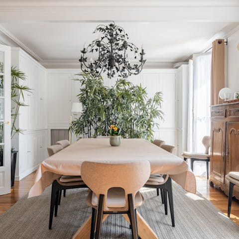 Enjoy some steak frites under the light of the chandelier