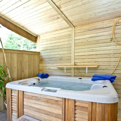 Relax with a soak in the covered hot tub