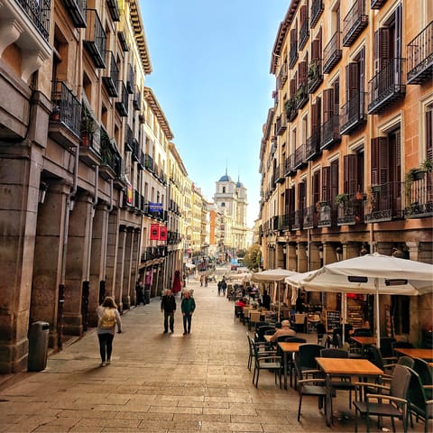 Stroll to Plaza Mayor to sip coffee and people-watch