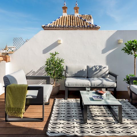 Soak up the Seville sunshine from the stylish rooftop terrace