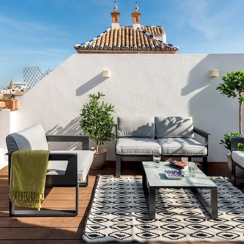 Soak up the Seville sunshine from the stylish rooftop terrace