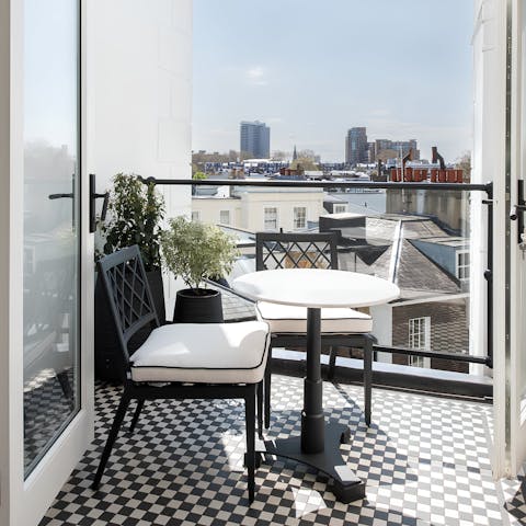 Admire Kensington's rooftops from the private terrace