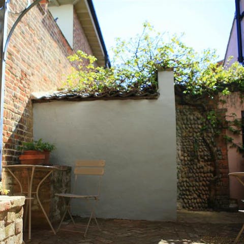 Spend an afternoon relaxing in the shade of your walled courtyard