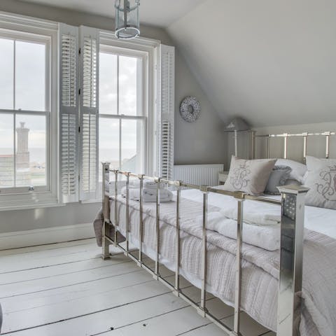 Have breakfast in bed and enjoy the sea view from the master bedroom