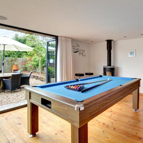 Enjoy a friendly round of pool in the games room