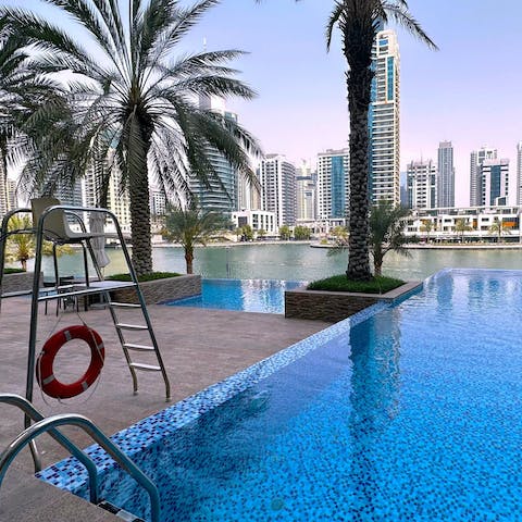 Enjoy a relaxing dip in the communal infinity pool