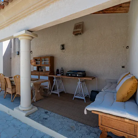 Enjoy a drink in the shade of the loggia when the sun is at its apex