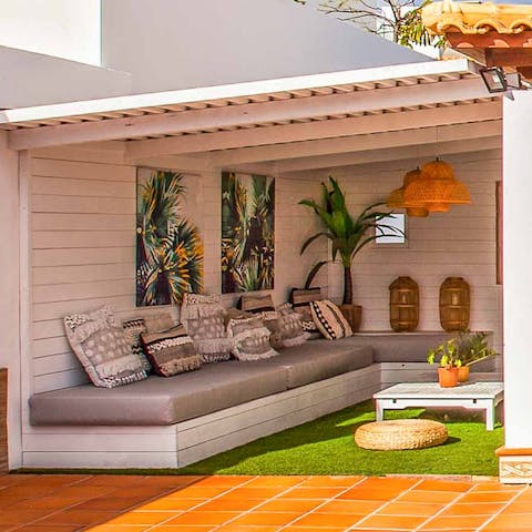 Relax in the shade of the outdoor living room