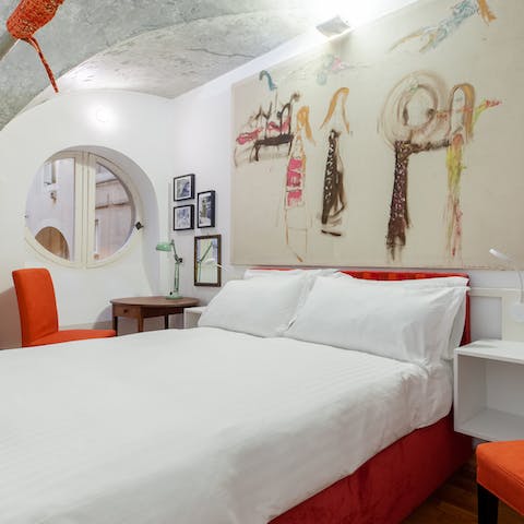 Sleep soundly in the large, comfortable beds beneath the vaulted ceiling