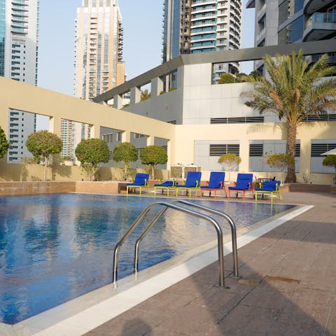 Cool off by the communal pool after a busy day of sightseeing