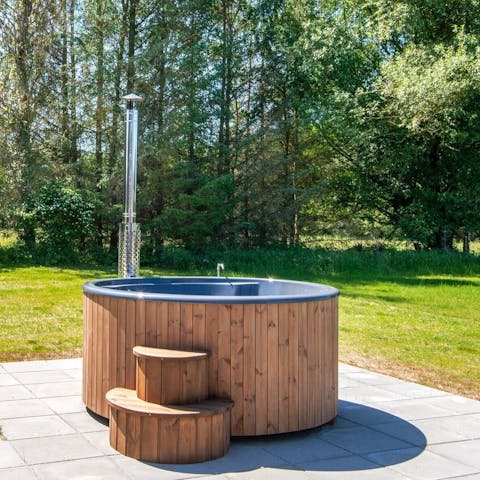 Embrace the natural elements from the outdoor hot tub