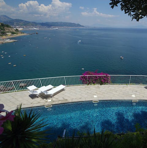 Savour the spectacular sea views from the poolside