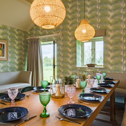 Set the table for a lavish meal in the playfully decorated open-plan kitchen and dining room