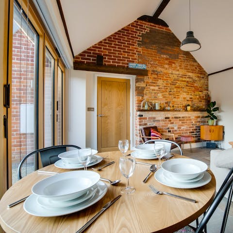 Dine in style with your friends in this unique living space with exposed brickwork