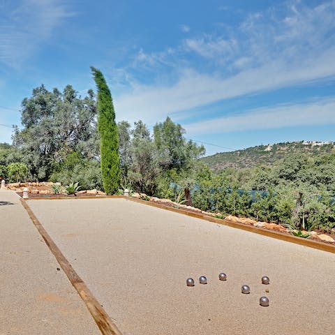 Soak up gorgeous views of the Algarve as you play a leisurely game of pétanque 