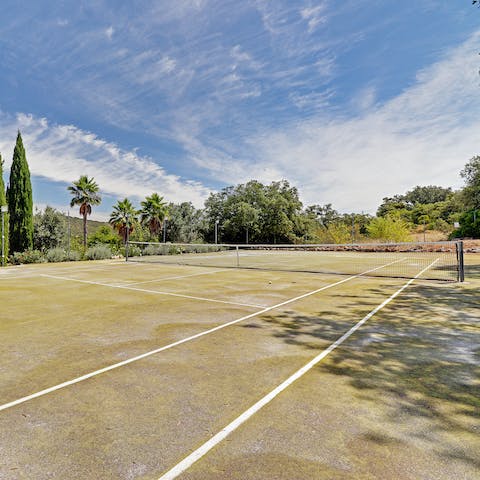 Practise your forehand on the private tennis court