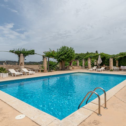 Spend relaxing days by the swimming pool with views across the valley
