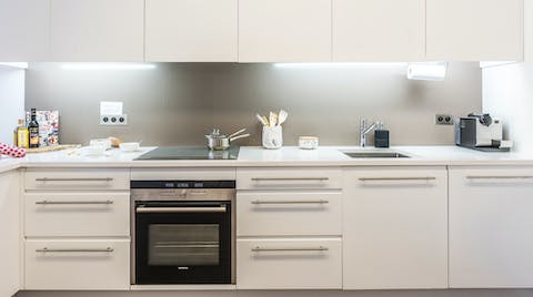 The sleek white kitchen