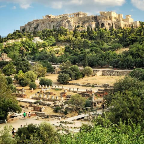 Explore the ancient ruins of the Acropolis, a four-minute walk away