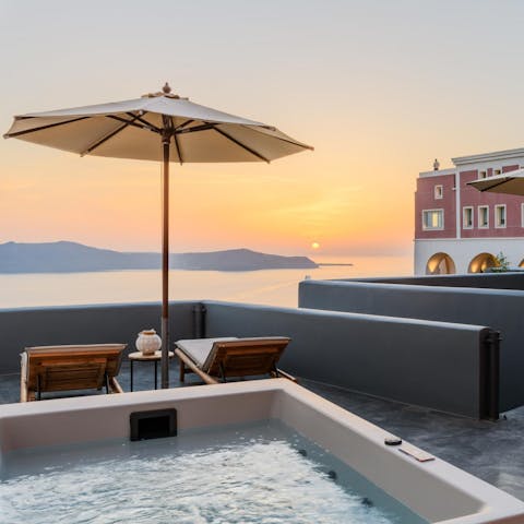 Drink in the sunset views from the warmth of the private Jacuzzi