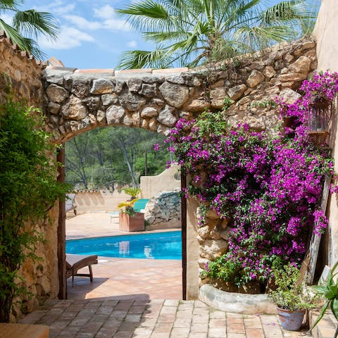 Bask in the privacy of your Bougainvillea-lined home