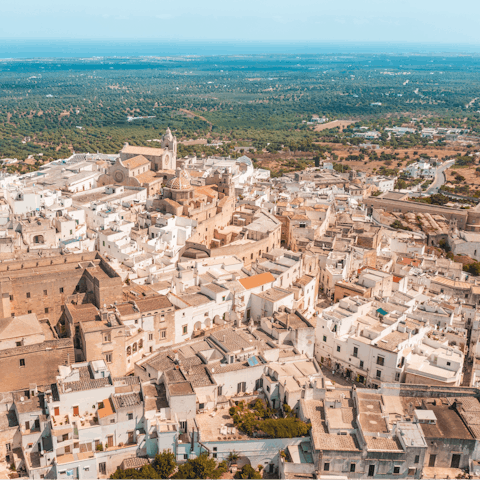 Drive into Ostuni and see its old town and unique architecture