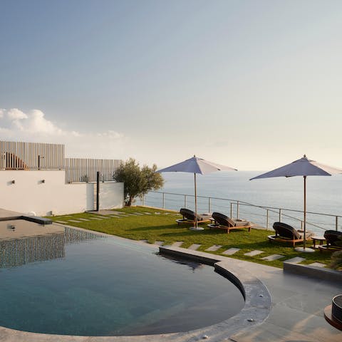 Chill by the private pool and take in the views of the Aegean Sea