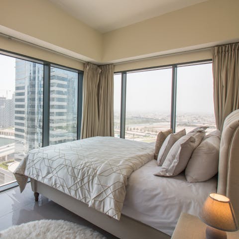 Wake up blissfully to panoramic views across the Dubai Canal and skyline