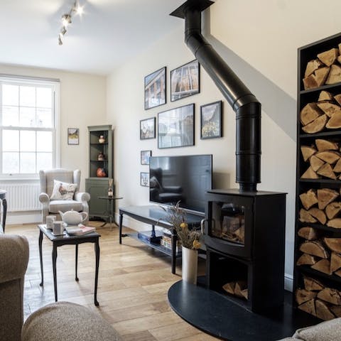 Cosy up by the stylish wood-burning stove