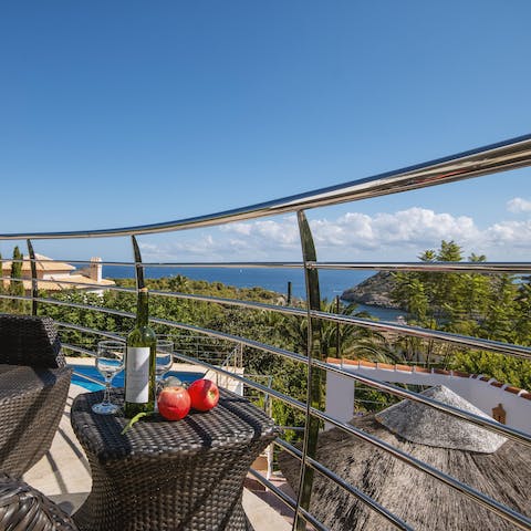Marvel at the Med while seated on the villa's first-floor balcony
