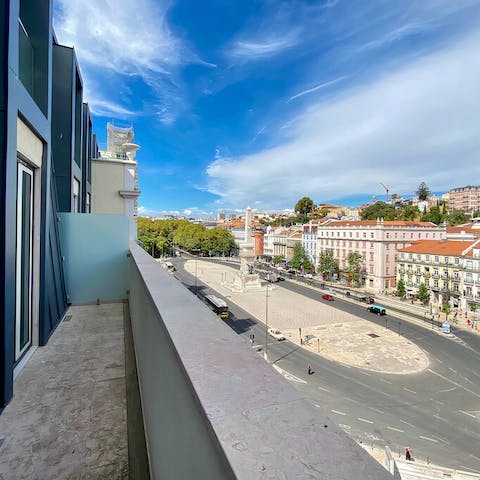Head out onto the apartment's balcony and gaze out over Praça dos Restauradores