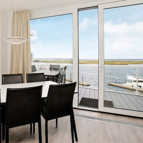 Enjoy a home-cooked meal with views across the water