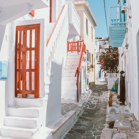 Spend an afternoon exploring the whitewashed Town of Mykonos 