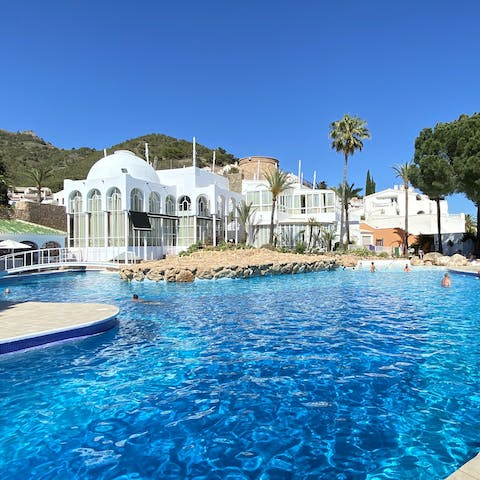 Pad down to the huge communal swimming pool for a lazy day 