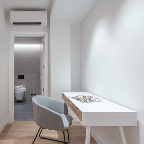 Catch up on work or read a magazine at the handy desk