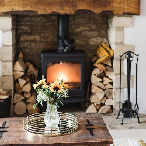 Snuggle up in front of the log burning stove
