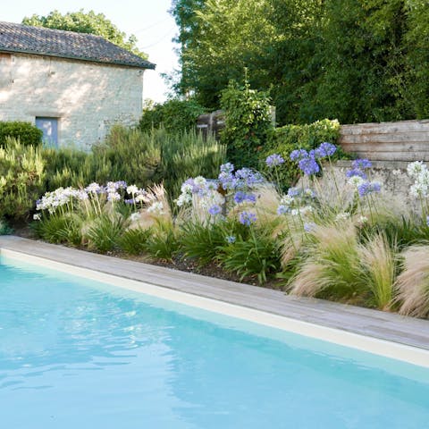 Swim in a pool surrounded by fragrant herbs