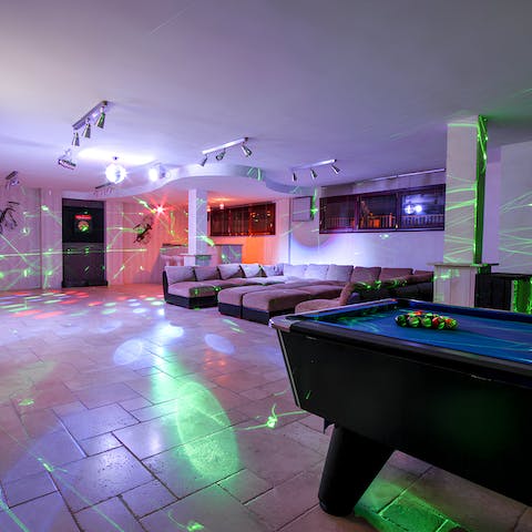 Put on your favourite playlist and enjoy family fun in the games room 