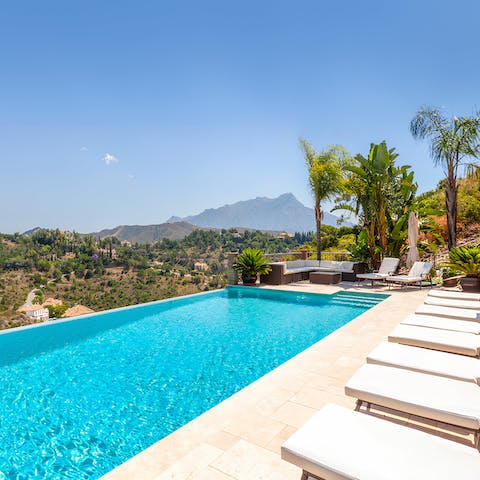 Savour beautiful views while relaxing by the pool