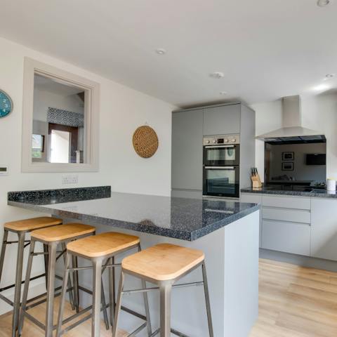 Enjoy coffee and biscuits around the kitchen island