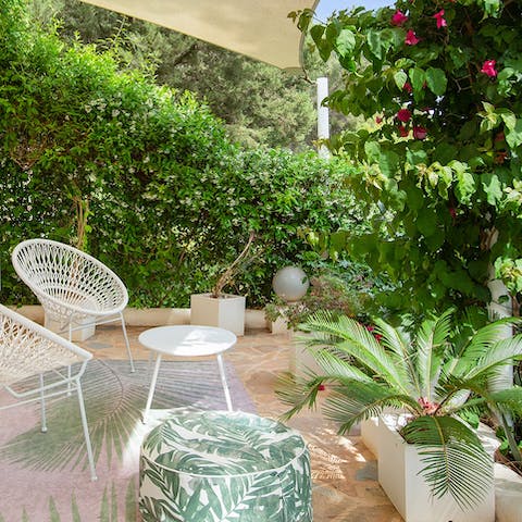 Relax with a great book on the lush terrace