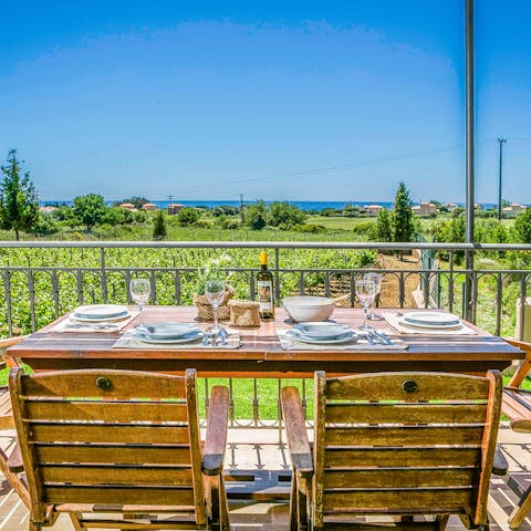 Serve up lunch on the balcony with verdant coastal views