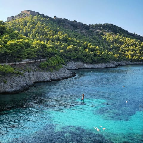 Swim and paddle in the crystal clear waters