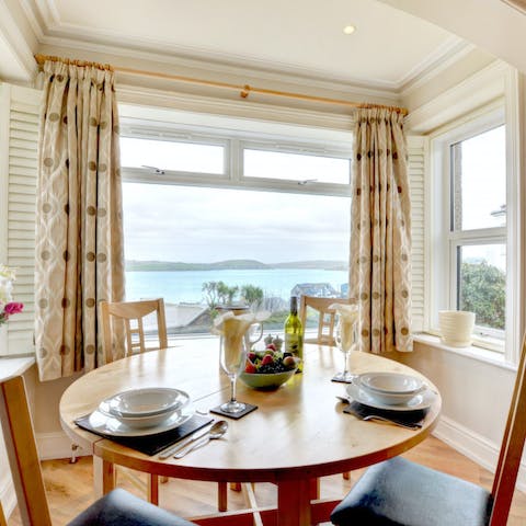 Sit down to a meal framed by huge view-giving windows