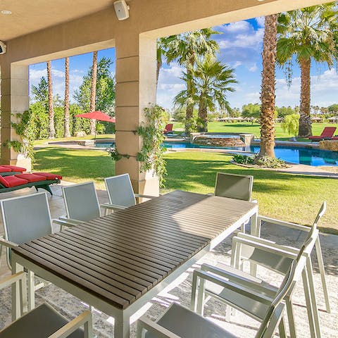Enjoy the fruits of grilling under the shade of the covered terrace