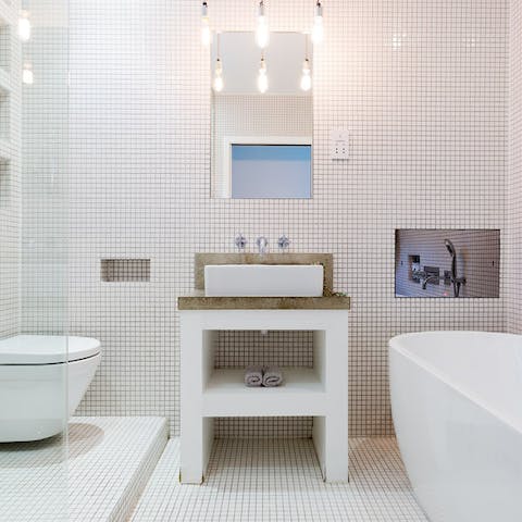 Pamper yourself in the stunning bathroom