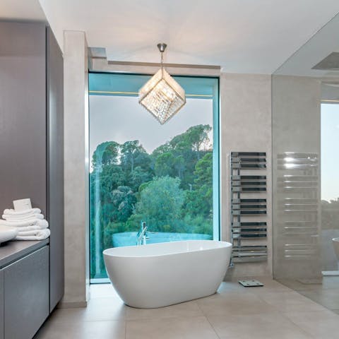 Luxuriate in the standalone bathtub with some gorgeous views