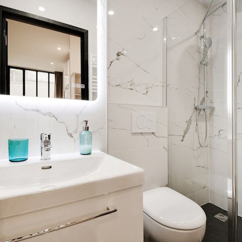 Get ready in the stylish bathroom for a night out in the City of Light 