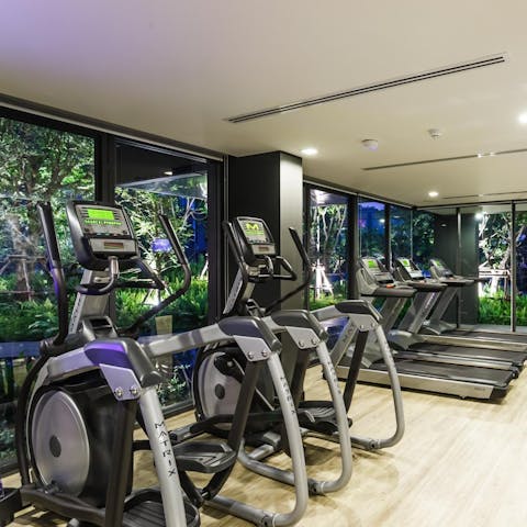 Keep on top of your fitness routine at the on-site gym overlooking the nature