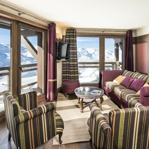Relax amid bespoke furnishings and stunning mountain views